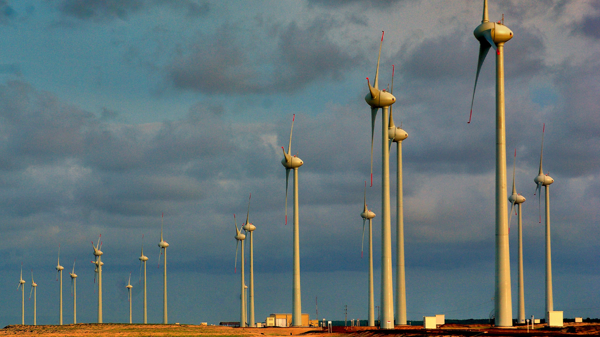 Imagem de várias turbinas de energia eólica